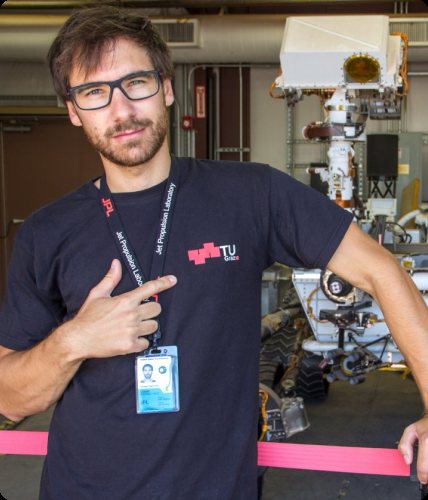 Armin Buchroithner at NASA's Jet Propulsion Laboratory, standing beside a Mars rover.